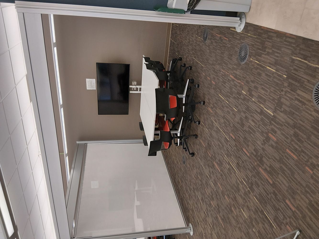 Collaborative group area with a large monitor